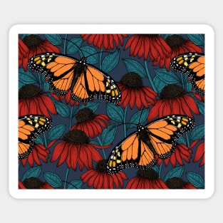 Monarch butterfly on red coneflowers Sticker